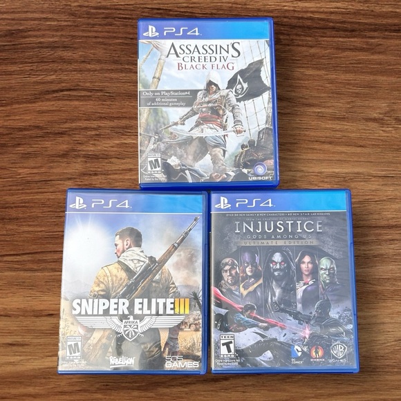 PS4 Games Lot INJUSTICE God's Among Us SUPER ELITE lll ASSASSINS CREED lV Bl… - Picture 1 of 5